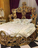 carved round bed