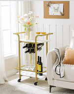 Gold-framed serving cart