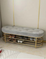 Carina Circular Solid Metal Shoe Rack in Golden Finish.