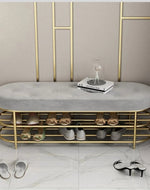 Carina Circular Solid Metal Shoe Rack in Golden Finish.
